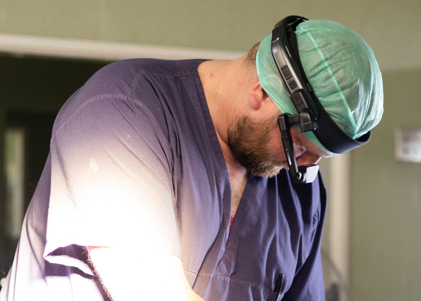 A doctor using AR headset in theater